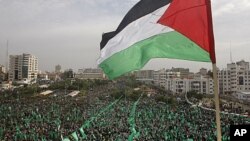 Tens of thousands of Hamas supporters gather during a rally to mark 24 years since its founding, in Gaza city, December 14, 2011.