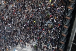 Protesters rally in Times Square in the Manhattan borough of New York City, June 1, 2020, against the death in Minneapolis police custody of George Floyd.