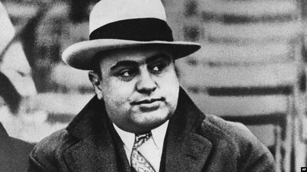 FILE - Chicago mobster Al Capone attends a football game, Jan. 19, 1931.