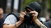 Un fotógrafo con un casco protector durante una protesta por los asesinatos de periodistas en México el 21 de agosto de 2019.
