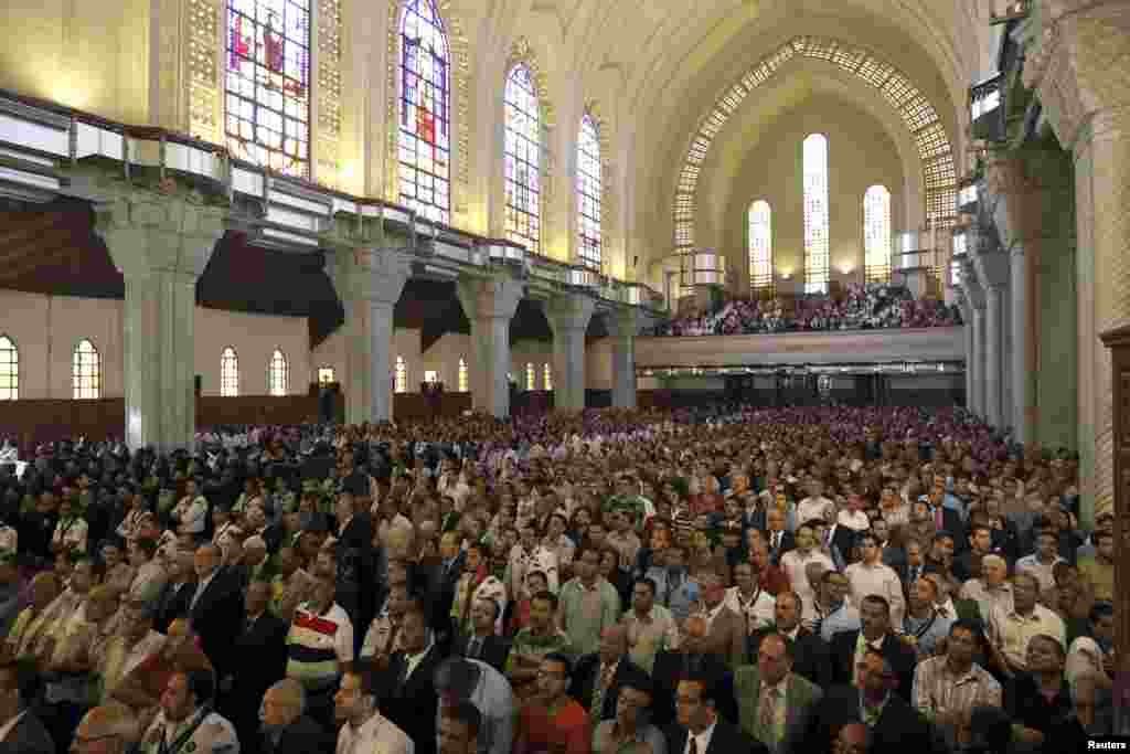 Egyptian Copts attend the ceremony during which the 118th leader of Egypt's Coptic Orthodox church, Tawadros II, was chosen in Cairo November 4