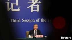 Chinese Foreign Minister Wang Yi speaks at a press conference on the sidelines of the National People's Congress in Beijing, China, March 7, 2025.