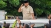 FILE - Indonesian Defense Minister Prabowo Subianto greets supporters in Jakarta, Indonesia, Feb. 15, 2024. 