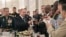 Russian President Vladimir Putin (C) toasts with the graduates of Russian military academies in the Kremlin in Moscow, Russia, June 28, 2018. 