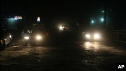 FILE - Traffic at night in Kabul, Afghanistan.