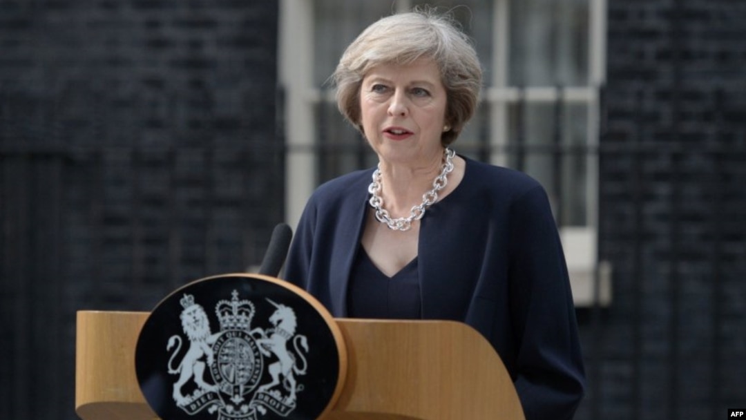 Theresa May memberikan pidato pertama sebagai perdana menteri Inggris di London, Rabu (13/7). 