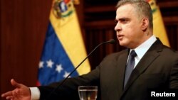 Venezuela's chief prosecutor Tarek William Saab gestures as he talks to the media during a news conference in Caracas, Venezuela, Nov. 2, 2017.