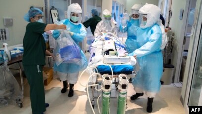 medical staff in protective suits