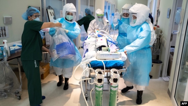 medical staff in protective suits