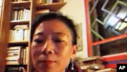 唯色通過Skype接受美國之音藏語組專訪的視頻截圖