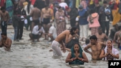 Millions of Hindu devotees gather for Maha Kumbh festival