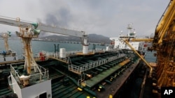 FILE - The Iranian tanker Fortune is anchored at the El Palito refinery near Puerto Cabello, Venezuela, May 25, 2020. U.S. officials said Aug. 13, 2020, that the Trump administration had seized the cargo of four tankers transporting fuel to Venezuela.