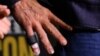 Australian actor Hugh Jackman (detail finger) stands on stage for “Deadpool and Wolverine” celebration of life fan event during Comic Con International in San Diego, California, July 25, 2024. (Photo by Chris DELMAS / AFP)