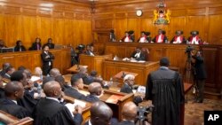 Kenyan Supreme Court judges deliver their detailed ruling concerning the August presidential elections, at the Supreme Court in Nairobi, Kenya, Sept. 20, 2017.