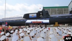 Foto divulgada por la agencia de prensa norcoreana KCNA muestra la presentación el 6 de septiembre de 2023de un nuevo submarino en un lugar no revelado de Corea del Norte.