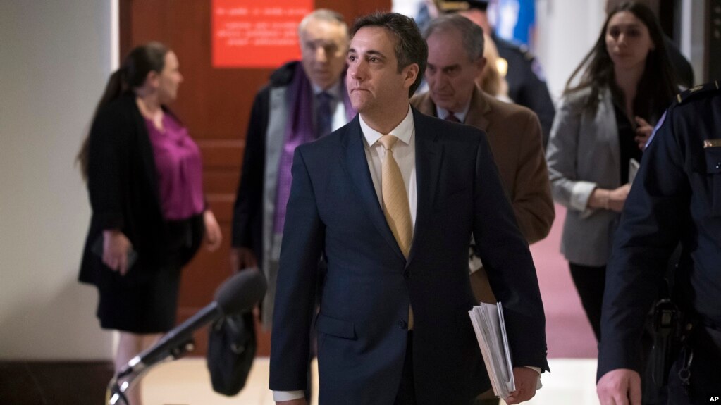Michael Cohen, President Donald Trump's former lawyer, leaves a closed-door interview before the House Intelligence Committee at the end of three days of congressional testimony, in Washington, Thursday, Feb. 28, 2019.