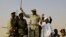 FILE: Lieutenant General Mohamed Hamdan Dagalo, deputy head of the military council and head of paramilitary Rapid Support Forces (RSF), greets his supporters as he arrives at a meeting in Aprag village, 60 kilometers away from Khartoum, Sudan, June 22, 2019.