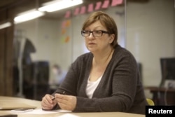 Founder Galina Timchenko of the independent, Russia-focused, media start-up Meduza listens during an interview in Riga, Latvia, March 30, 2015.