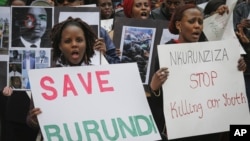 FILE - Burundi nationals from across the U.S. and Canada demonstrate outside U.N. headquarters in April, calling for an end to political atrocities and human rights violations unfolding in Burundi under the government of President Pierre Nkurunziza.