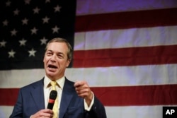 British politician Nigel Farage speaks at a rally for U.S. Senate hopeful Roy Moore, Sept. 25, 2017, in Fairhope, Alabama.