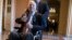 FILE - Sen. John McCain, R-Ariz., leaves a closed-door session where Republican senators met on the GOP effort to overhaul the tax code, on Capitol Hill in Washington, Dec. 1, 2017.