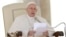 Pope Francis delivers his message during his weekly general audience in St. Peter's Square at the Vatican, Sept. 26, 2018. 