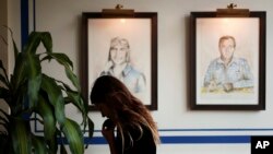 Hostess Mia Kalo mans the front door at Alon Shaya's restaurant Saba in New Orleans, Aug. 23, 2018. Shaya, an award-winning New Orleans chef, used to head three restaurants that were part of the Besh Restaurant Group. But about a year ago allegations of sexual misconduct at several of the restaurants contributed to an acrimonious split. Now Shaya has started a new restaurant venture, Pomegranate Hospitality, with his wife which includes restaurants in New Orleans and Denver. 
