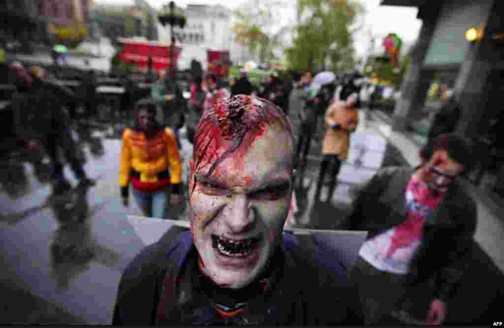 An actor dressed as a zombie walks on a street in downtown Belgrade, Serbia, as part of a promotional campaign for the upcoming TV series "The Walking Dead." The event is taking place over 24 hours in 26 cities around the world ahead of the show's U.S. pr