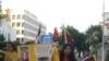 西藏真相火炬在驻洛中领馆前游行 ( 美国之音 容易拍摄)