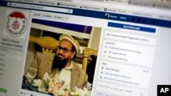 A photo shows a Facebook site that features one of India’s most wanted, Hafiz Saeed, the founder of Lashkar-e-Taiba, a banned organization and a U.S. declared terrorist group, in Islamabad, Pakistan, July 7, 2017. 