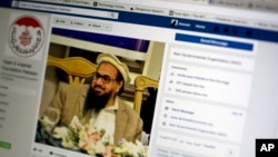 A photo shows a Facebook site that features one of India’s most wanted, Hafiz Saeed, the founder of Lashkar-e-Taiba, a banned organization and a U.S. declared terrorist group, in Islamabad, Pakistan, July 7, 2017.