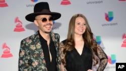 FILE - Jesse Huerta and Joy Huerta, of Jesse & Joy, arrive at the 16th annual Latin Grammy Awards in Las Vegas, Nov. 19, 2015. The duo was nominated for four Latin Grammys, Sept. 21, 2016.
