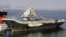 This photo taken on September 24, 2012 shows China's first aircraft carrier, a former Soviet carrier called the Varyag, docked after its handover to the People's Liberation Army (PLA) navy in Dalian, northeast China's Liaoning province. 