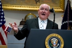 FILE - Agriculture Secretary Sonny Perdue speaks in the Roosevelt Room of the White House, May 19, 2020.