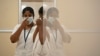 FILE - Nurses speak inside a newly created mpox isolation ward at a hospital in Chennai, India, Aug. 27, 2024.