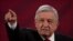 FILE - Mexico's President Andres Manuel Lopez Obrador gives his daily, morning news conference at the presidential palace, Palacio Nacional, in Mexico City, July 13, 2020.