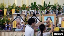 Relatives Mourn Taiwan Plane Crash Victims