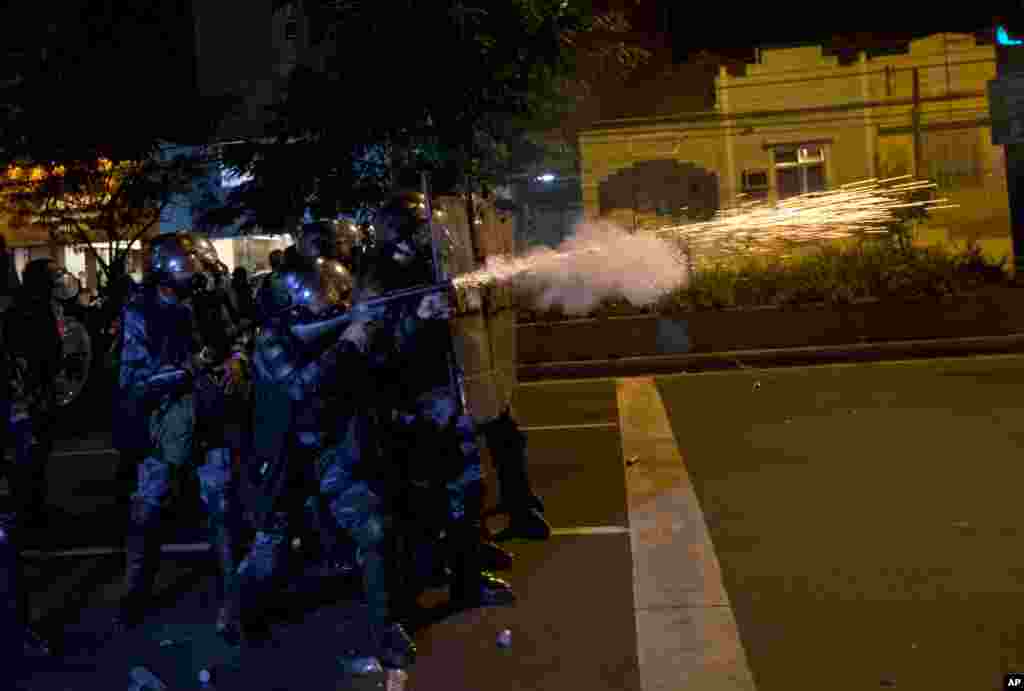 Brazilian police shoot tear gas at demonstrators during an anti-government protest in Rio de Janeiro's sister city, Niteroi, June 19, 2013.