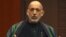 Afghan President Hamid Karzai speaks to the media during a news conference, Dec. 12, 2012.