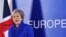 FILE - British Prime Minister Theresa May speaks during a media conference at the conclusion of an EU summit in Brussels, Nov. 25, 2018. 