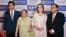 FILE - Mukesh Ambani (R), chairman of Reliance Industries Ltd, poses with his wife Nita (2nd R), mother Kokilaben (2nd L) and son Akash, before addressing the company's annual shareholders' meeting in Mumbai.
