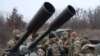 El comandante de las Fuerzas Armadas ucranianas, general Seggiv Nayev, habla con sondados que tomaron parte en operaciones de defensa en la región de Kiev, el 3 de enero de 2024.
