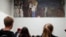 Visitors look at Gustav Klimt's Beethoven Frieze, one of the country's most famous artworks, at the Secession museum in Vienna, Oct. 16, 2013. 