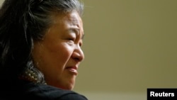 FILE - Tina Tchen, then-chief of staff to U.S. first lady Michelle Obama, is seen at the Eisenhower Executive Office Building in Washington, May 27, 2014. Tchen is head of the legal defense fund for the Time's Up effort to fight workplace sexual harassment.