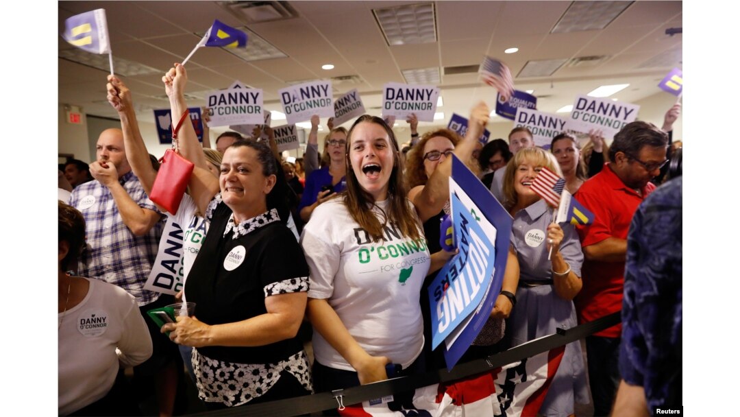 Supporters cheer as results come in for Democratic candidate Danny O’Connor in a special congressional election in Ohio’s 12th district, at the election night party in Westerville, Ohio, Aug. 7, 2018.