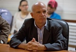 FILE - On Jan. 20, 2016, United Socialist Party of Venezuela lawmaker Hugo Carvajal attends a meeting at the National Assembly administrative offices, in Caracas, Venezuela.