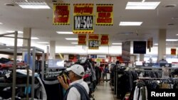 Store closing signs at a Sears in New Hyde Park, New York, Oct. 10, 2018. 