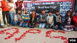 Children holding vigil for army public school peshawar, in Islamabad Pakistan-15 Dec 2015