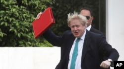 British Foreign Secretary Boris Johnson, reacts as he arrives at the Greek foreign ministry prior his meeting with Greek Foreign Minister Nikos Kotzias, in Athens, on Thursday, April 6, 2017. 