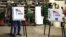 FILE - Voters cast their ballots at a polling station set up in a garage during the U.S. presidential election, near Fernald, Iowa, Nov. 8, 2016.